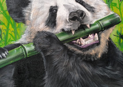Panda réalisé en fresque sur un garage